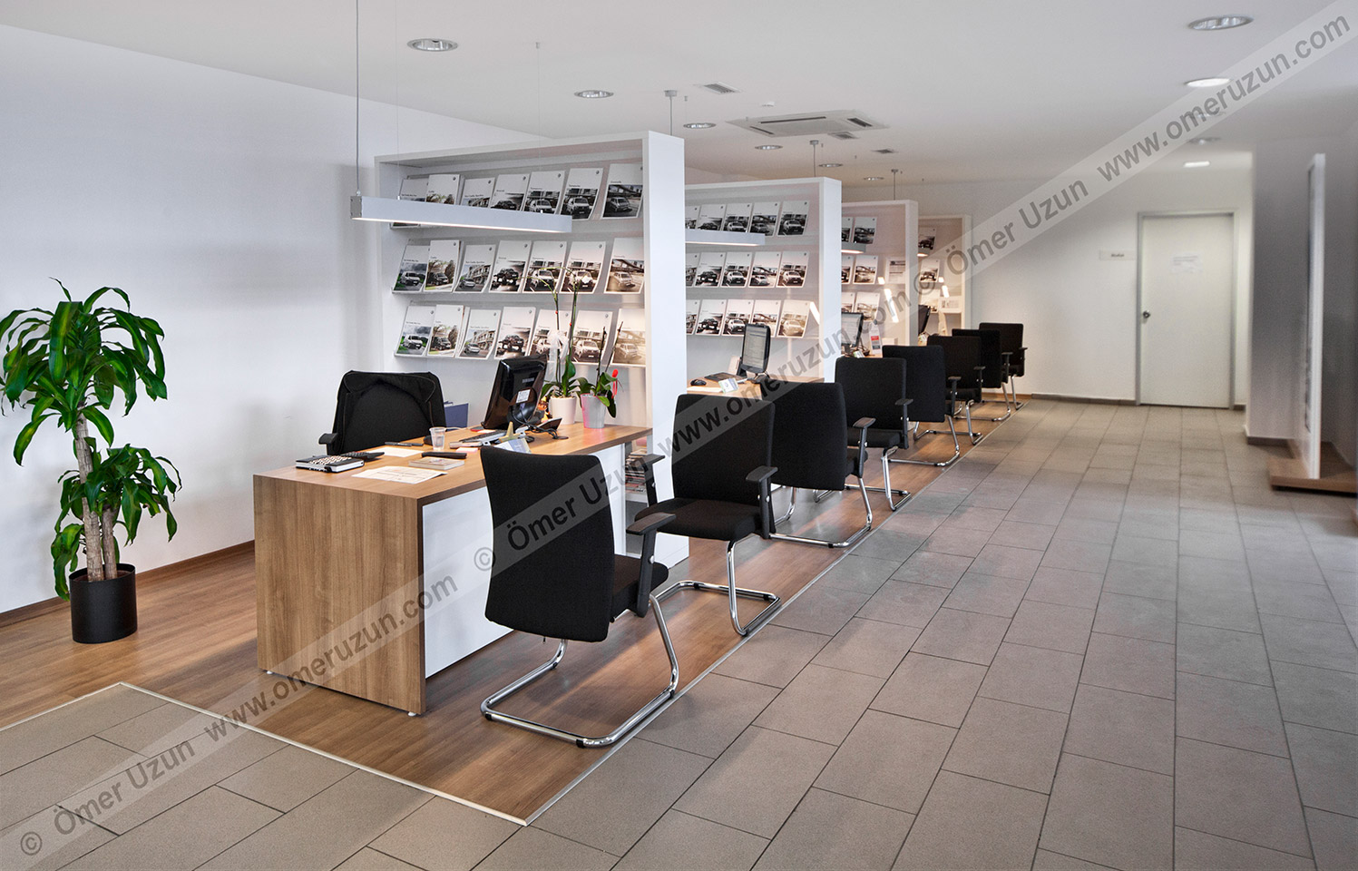 Erel Automotive Car Showroom working desks with book shelfs