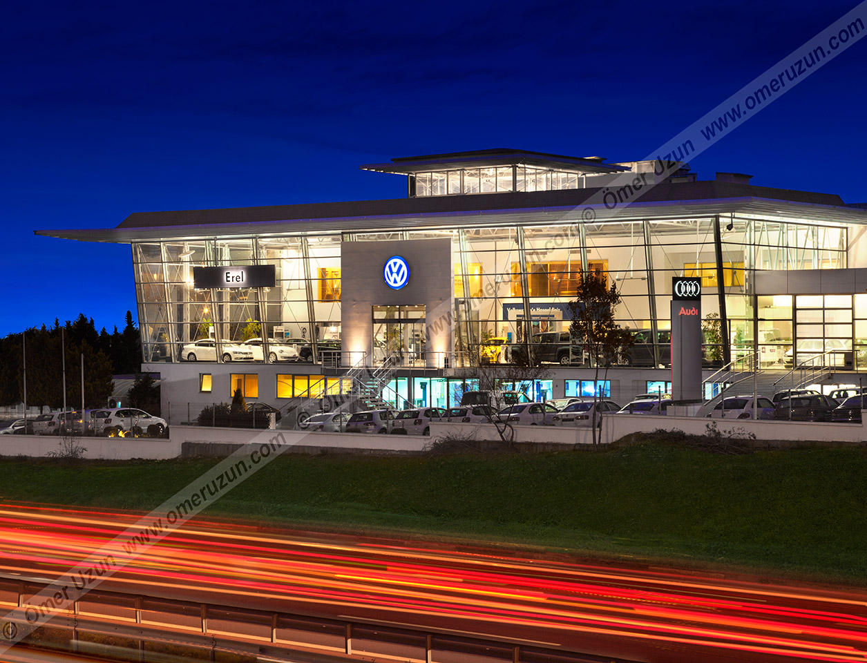 Erel Automotive Car Showroom exterior evening corner view